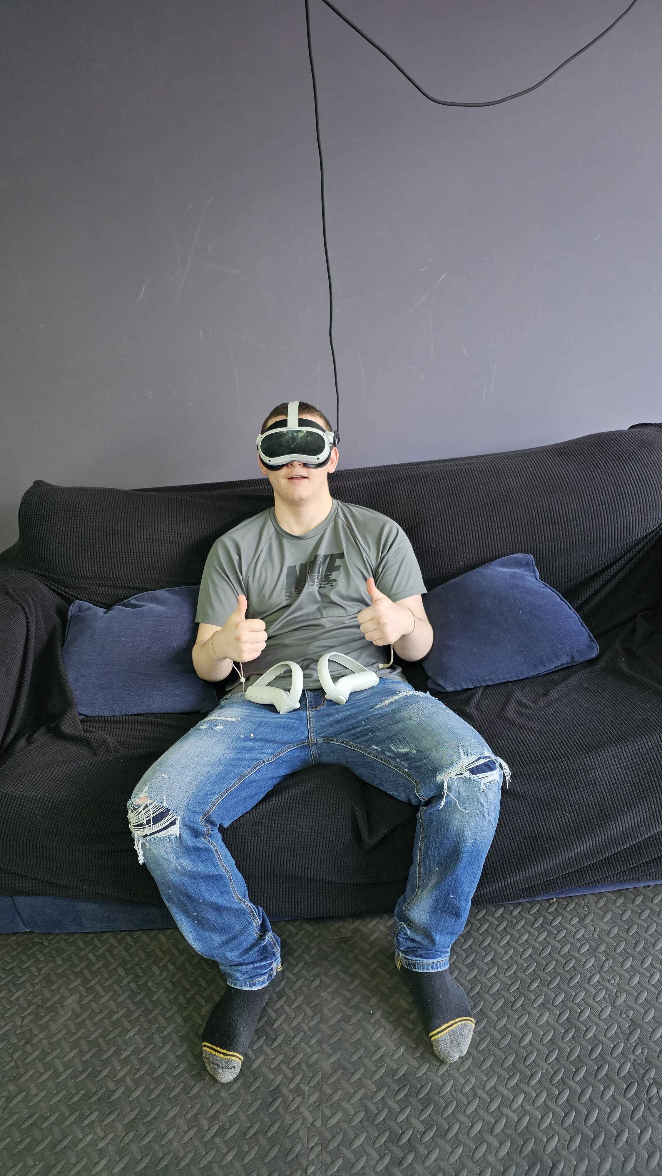 Student enjoying an immersive VR gaming experience at Player Ready. Our VR sessions provide students with cutting-edge technology experiences in a fun and engaging environment.